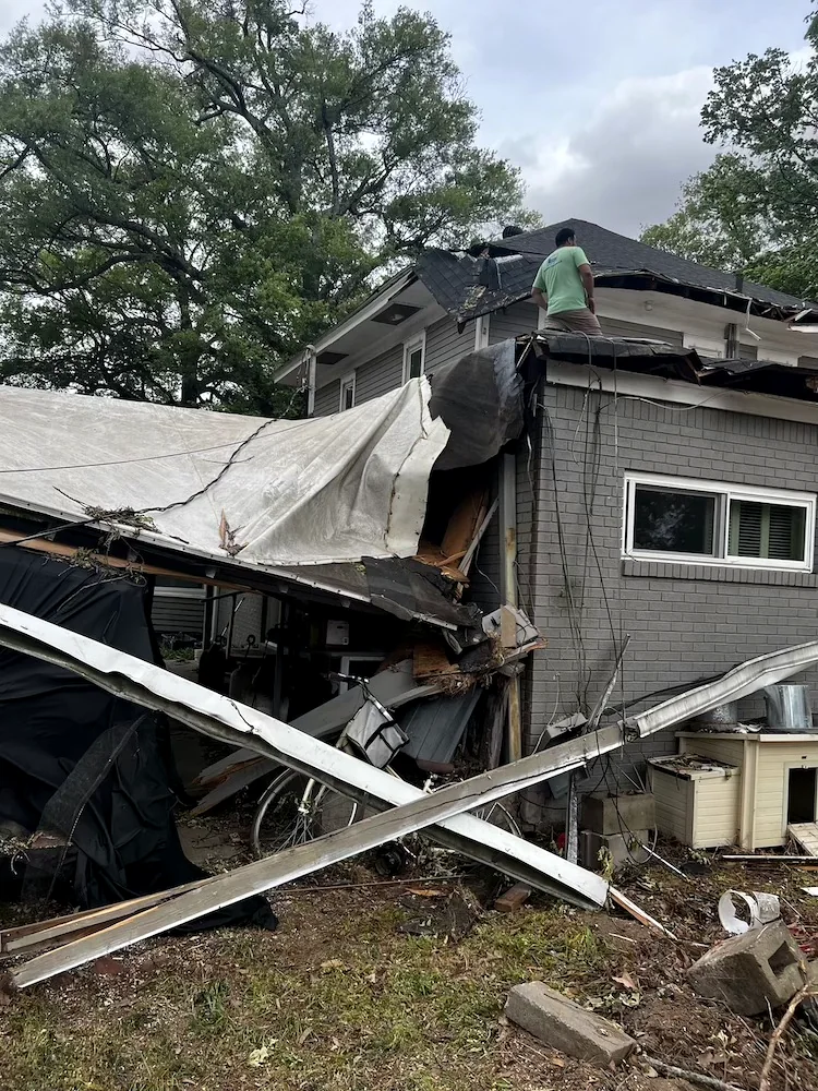 Storm-damaged property restoration by Herring Roofing and Construction